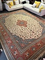 Full view of carpet under sectional sofa