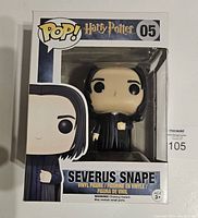 Front view of the Severus Snape Funko Pop figure in its box, showing the figure and branding.