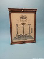 Full view of the framed 1921 Masonic membership certificate with architectural columns and Masonic symbols on the certificate.
