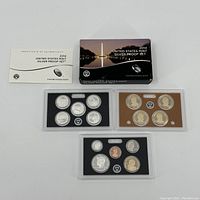 Full view of 2014 United States Mint Silver Proof Set including coins in plastic holders, certificate of authenticity and original box.