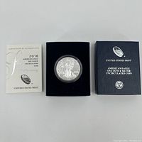 2016 American Eagle silver coin in case with certificate of authenticity and original box