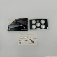 Complete 2018 America the Beautiful Quarters Silver Proof Set displayed with coins, certificate, and original packaging.