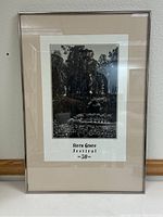 Framed black and white photograph poster of Stern Grove Festival by Ansel Adams, showing crowd and orchestra in outdoor setting.