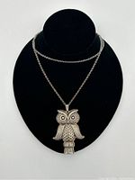 Owl pendant on black necklace bust showing full necklace length and pendant size.