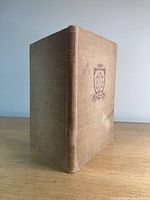 Front angled view of the hardcover book showing spine and front cover