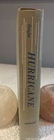 Spine of the hardcover book showing title "Hurricane" by Douglas and publisher Rinehart.