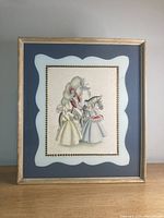 Framed vintage European sketch portrait with two women and a soldier, blue matte and gold border, vintage look.