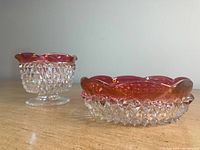 Two vintage Indian glass ruby diamond point pieces: candy dish and bowl, clear cut with ruby red rim.