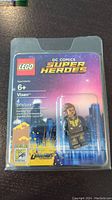Front of sealed blister card showing LEGO and DC Comics Super Heroes logos, Vixen name and 4-piece count.