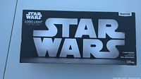 Front view of the Paladone Star Wars Logo Light box showing product name and branding.