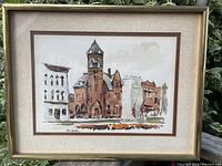 Framed original watercolour painting depicting The Old Post Office building in Kitchener with visible details of the architectural style and colors used.