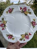 Front of Shelley Begonia fine china plate showing floral pattern and scalloped edge.