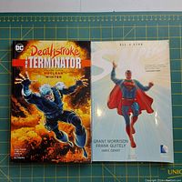 Front covers of Deathstroke The Terminator and All-Star Superman trade paperbacks