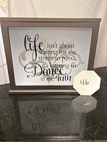 Front view of light box showing the inspirational quote on the illuminated panel.