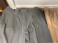Grey women's pants size 14 with button closure