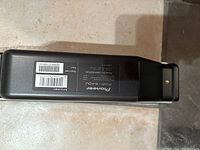 Bottom view of the Pioneer PDP-S4OU sound bar showing model and power information stickers.