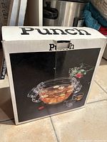 Front of the original box showing vintage punch bowl set with punch and fruit slices in bowl.