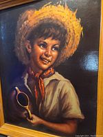 Close-up image of the lithograph print showing a young boy in a straw hat with a warm smile, holding a small round object.