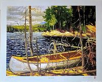 Overall view of the print showing the artwork of the canoe and lakeside trees in vibrant color on thick lithograph paper. Numbered 215/350 and titled 'The Canoe' by Tom Thomson.