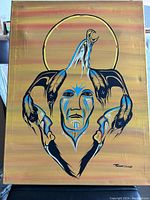 Front view of the Indigenous acrylic painting depicting a human face with birds and circular halo design in traditional style.