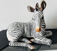 Front view of the Grevy zebra foal figurine showing detailed facial markings and realistic coloring.