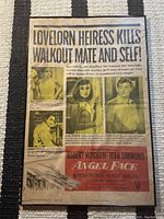 Front of movie poster showing bold headline, images of cast, and movie title.