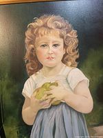Full view of the oil painting of a girl holding green apples against a dark background.