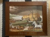 Full view of framed print showing Noah's Ark with animals entering two by two, set in dark walnut stained wood frame.