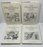 Front covers of four volumes with dust jackets