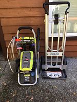 Full view of Ryobi pressure washer and Cosco dolly side by side