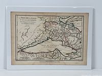 Overview photo of the antique engraved map showing its full layout and hand coloring.