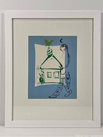 Full frontal view of framed lithograph showing white frame and mat