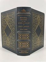 Spine and front/back leather covers showing gilt decorations and title lettering on the book.