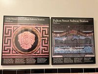 Two framed posters side-by-side showing the 137th Street City College and Fulton Street Subway Stations with detailed images and text.