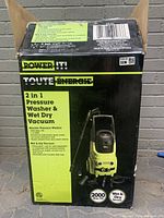 Photograph of the sealed product box showing product image and key features.