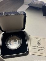 1992 Bermuda silver commemorative coin in black protective case with certificate.