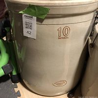 Side view of the 10 gallon crock showing Medalta Potteries Ltd mark and '10 Imperial' marking.