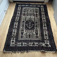 Full view of entire rug laid flat on floor