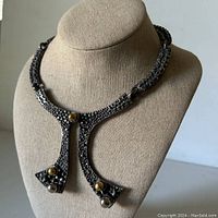 Front view of necklace displayed on bust