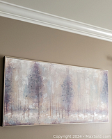 Front view of entire painting on wall beneath crown molding