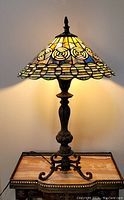 Front view of lamp lit on table