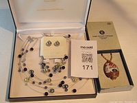 Set showing multi-strand necklace and matching earrings in original Fifth Avenue Collection box with Lord Nelson Pottery necklace in separate box.
