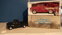 Black Chevrolet Cameo die cast pickup truck with the boxed red Chevrolet Telemania telephone on top.