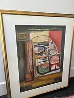 Front view of the framed abstract painting showing full composition