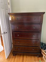 Front view showing entire highboy chest of drawers