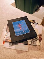 Stack of vinyl records topped by Pink Floyd Shine On box set