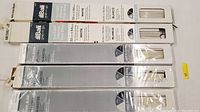 Five packaged window blinds stacked, showing labels for sizes and colors