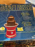 Original box of Rival Chocolate Fountain with detailed product information and images.