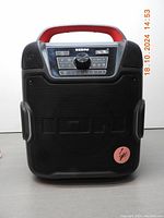 Front view of ION Pathfinder 320 portable Bluetooth speaker showing black and red rugged design and control panel.