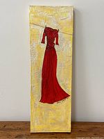 Full view of the vertical rectangular canvas showing the red dress on a textured yellow and white background.